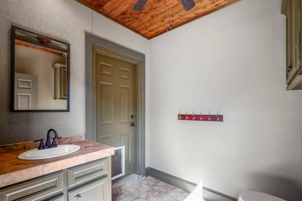The pool shower and bathroom is available for your family and guests convenience, and located at the end of the cabana.