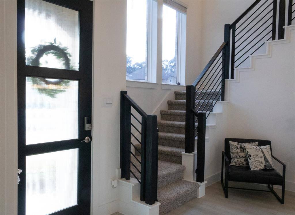 Front door, stairs to second floor