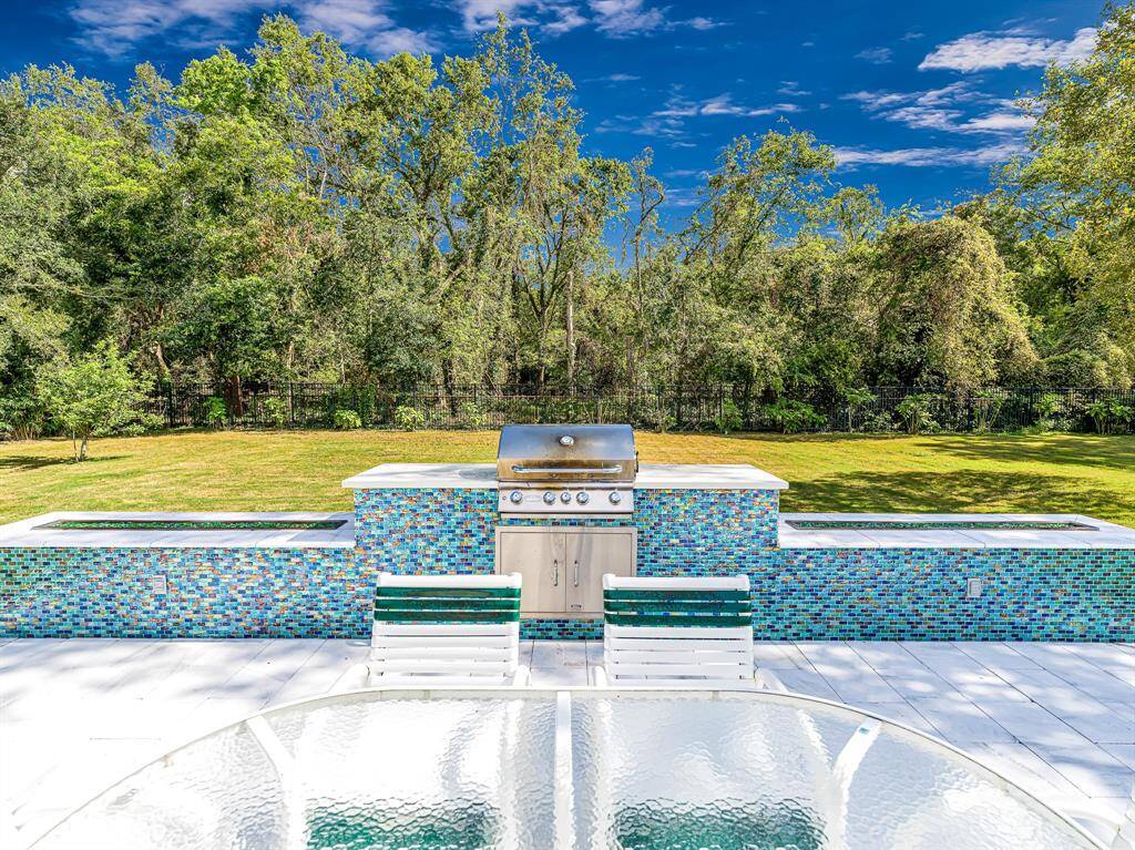Built-in BBQ with twelve linear feet of fire trenches
