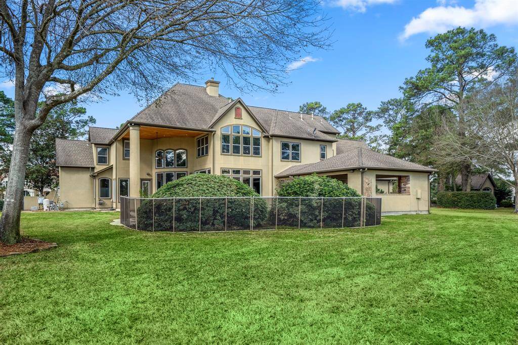 This property offers so many places to unwind. enjoy putting up some lounge chairs in the yard to watch the neighbors play a round of golf.