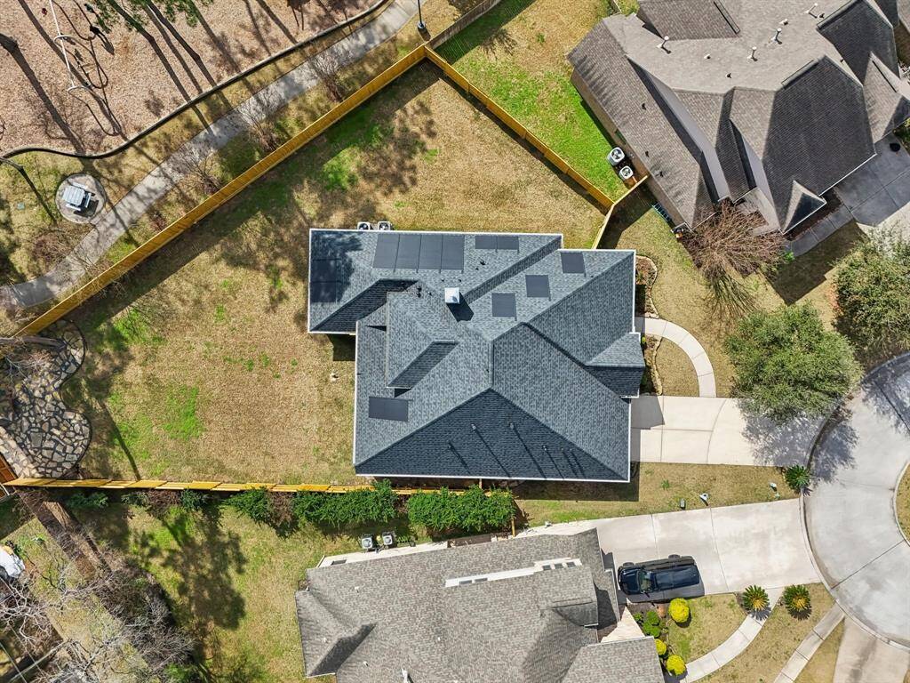 In this photo, you may notice solar panels. The entire roof was replaced less than 2 years ago and 8 KW GAF Solar Max Panels were installed. This greatly reduces KW usage. Additionally these panels blend into the roof better than most and are owned, not leased.