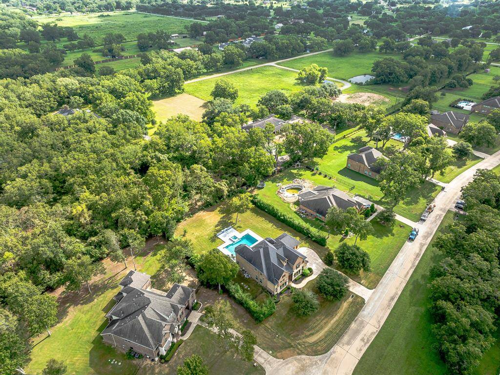 Nestled near cul-de-sac in beautiful gated community with lake