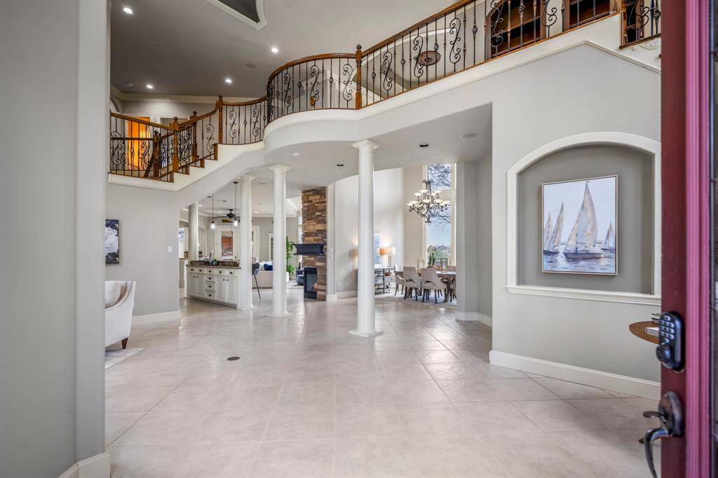 As you enter the home you are greeted with its timeless charm, soothing color palette, abundance of natural light and breathtaking golf course views.