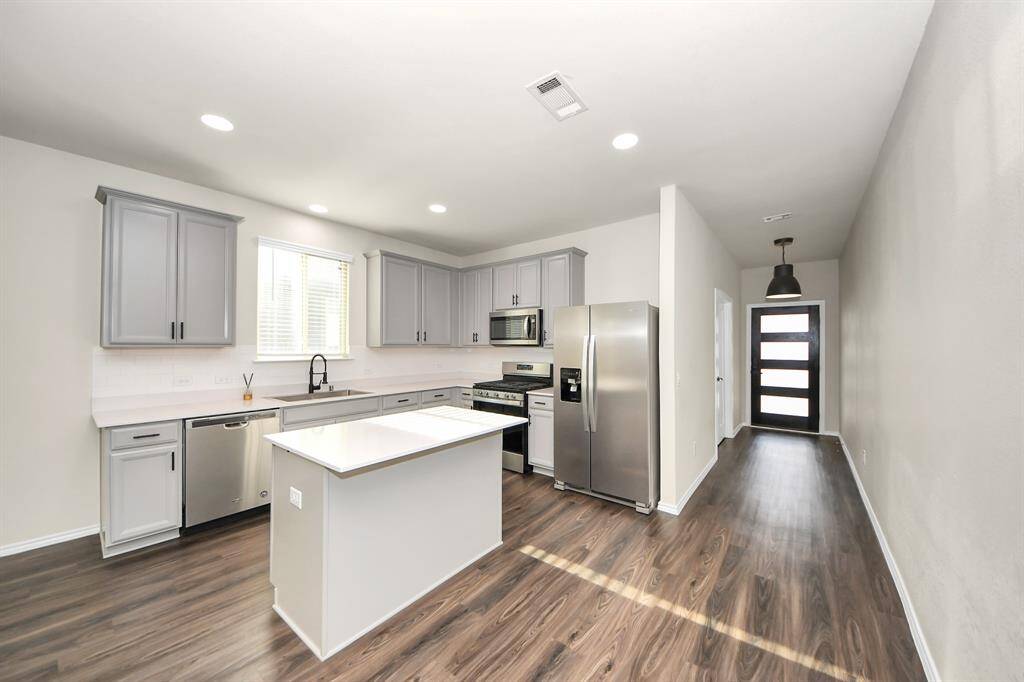 Kitchen - Premium Stainless Steel Farmhouse sink. Recessed light additions. Under-counter lighting additions