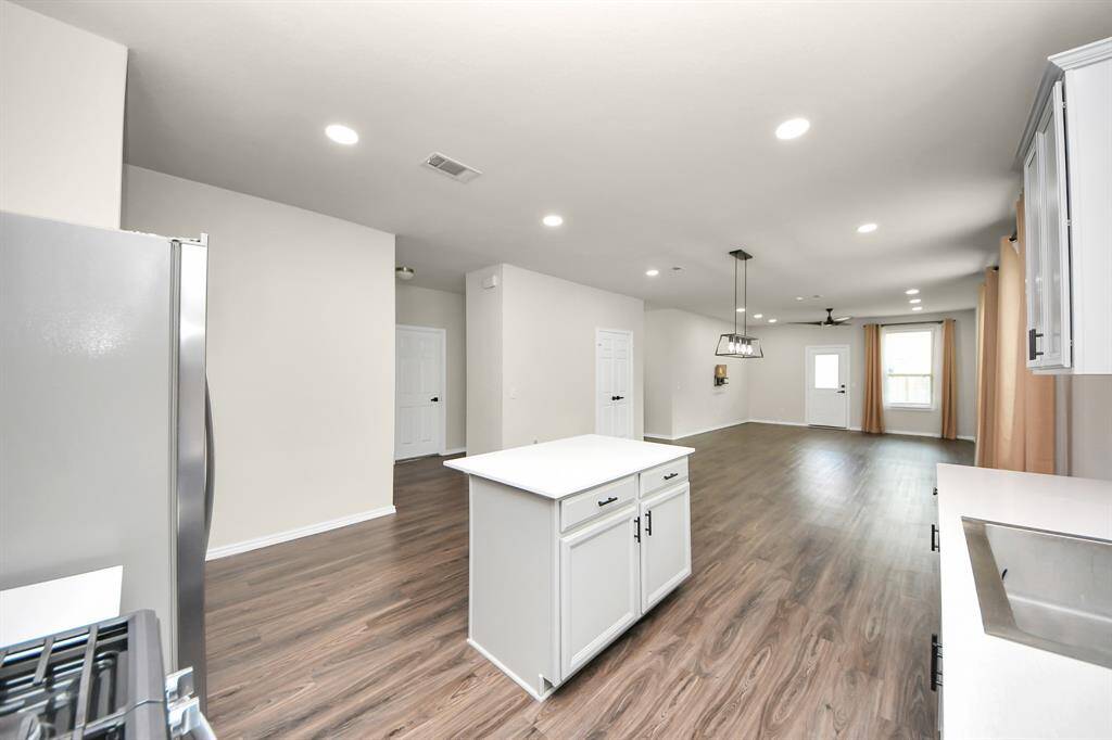 Kitchen - Premium Stainless Steel Farmhouse sink. Recessed light additions. Under-counter lighting additions