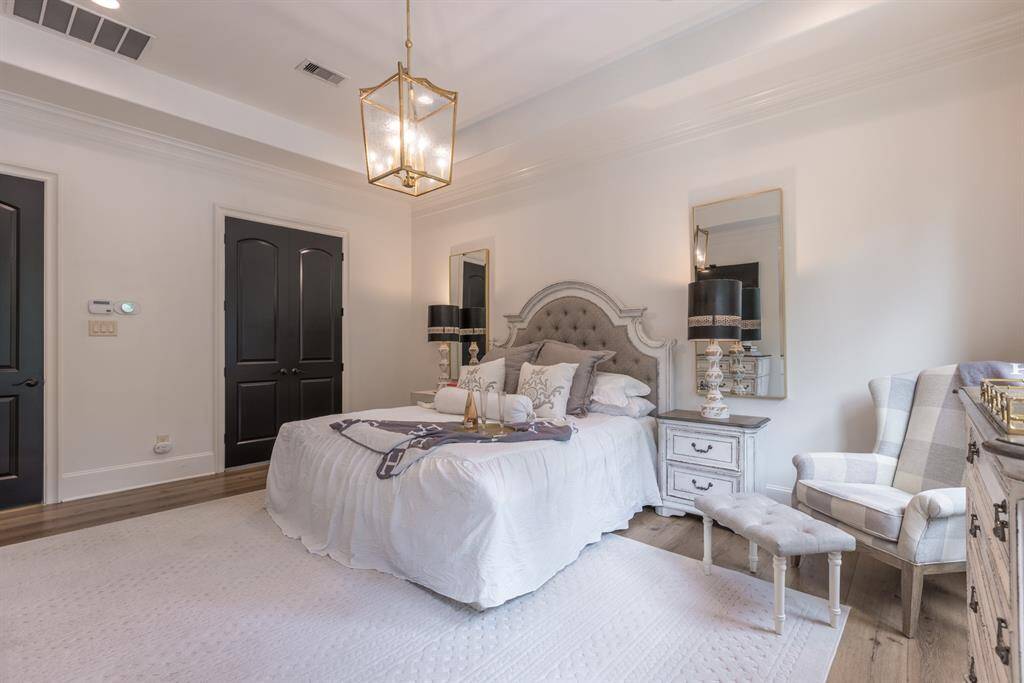 Spacious primary retreat with room for sitting space.