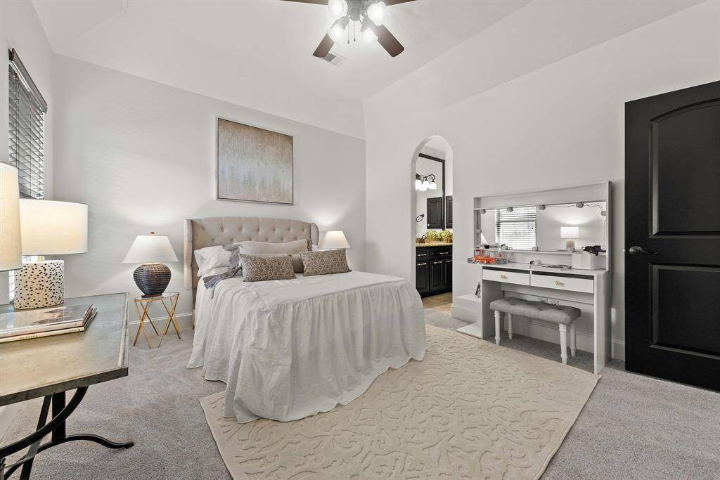 2nd bedroom upstairs with walk-in closet and private vanity.