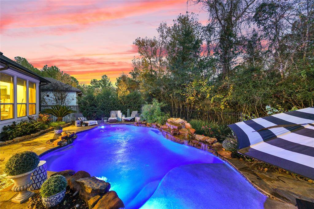 Enjoy evening sunsets in this backyard oasis.
