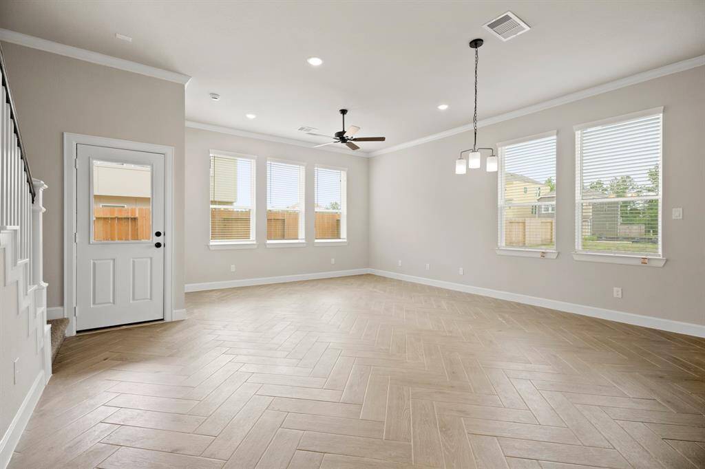 Three-story home with 3 bedrooms, 3.5 baths and 2 car garage