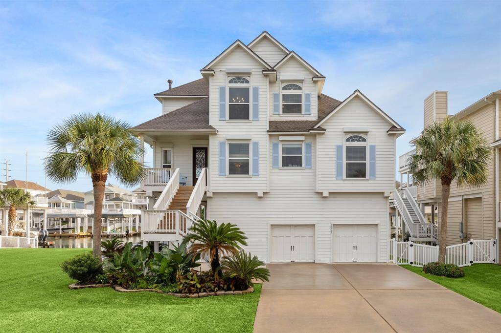 Located on the wide main canal. Views of the blue nature preserve lakes on the north . You're a short hop to the bay by boat or a quick golf cart ride to the beach on the south. Beautiful curb appeal . Movein ready, bring your overnight bag! Convenient electric shutters for energy efficiency and convenience. NEW catwalk, back stairs and back decks (June 2024)