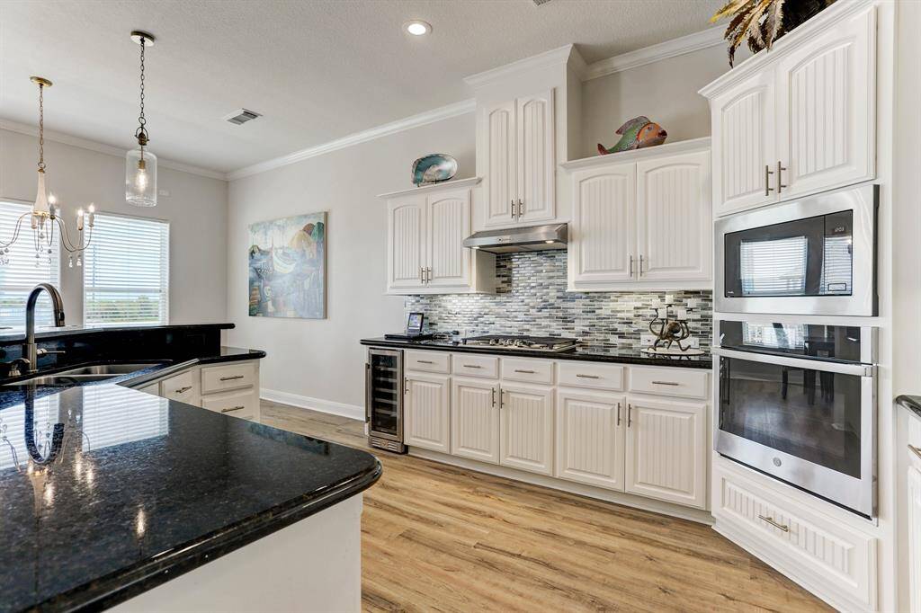 Loads of countertop space and cabinets for storage