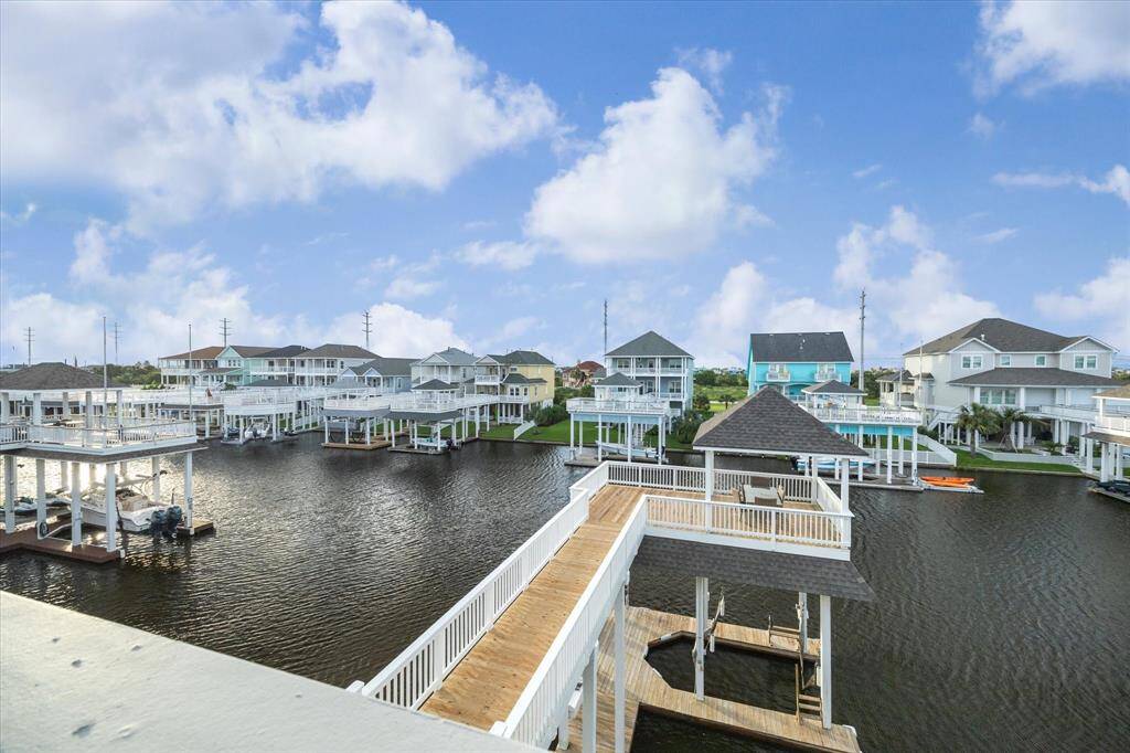 Master suite overlooks water. New roof house and boathouse , new catwalk, new decking  2024.