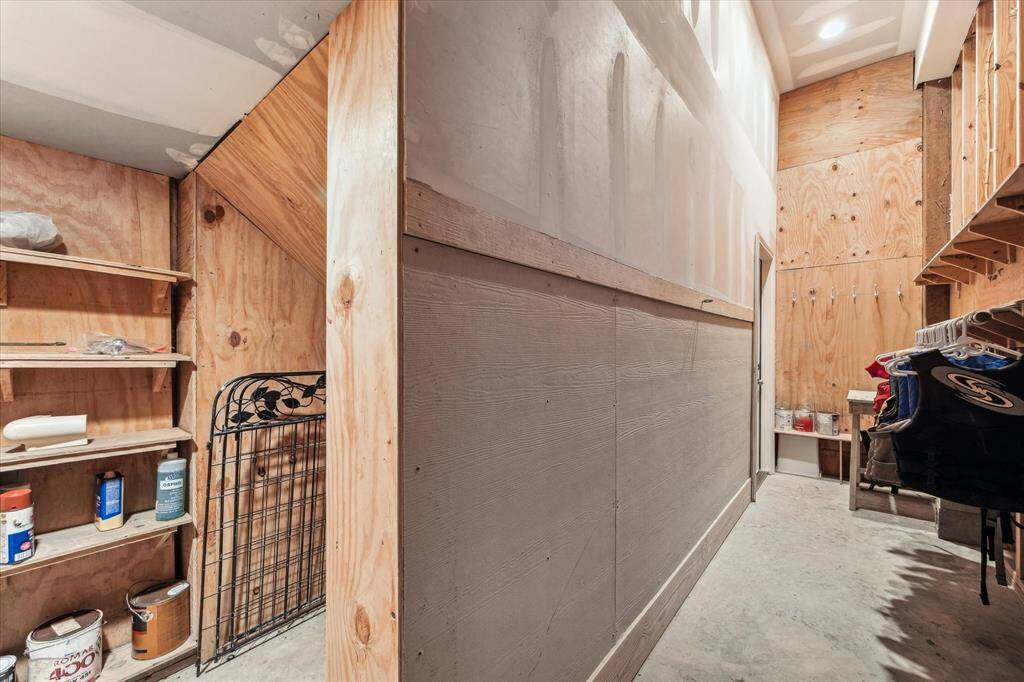 Large storage area under stairs for water toys, bicycles, etc