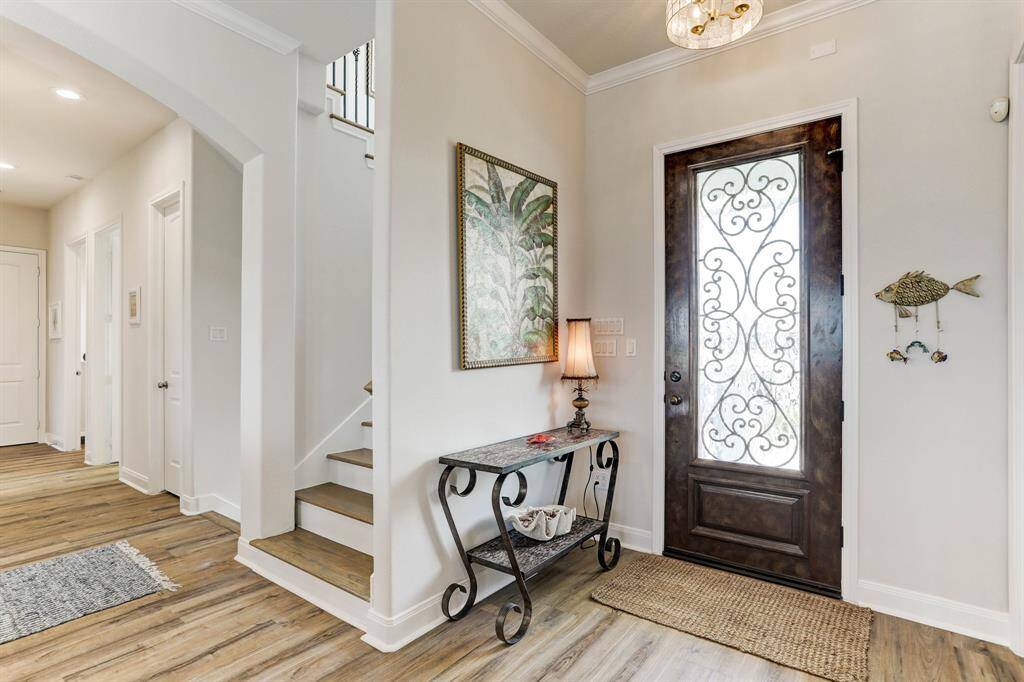Interior staircases from ground level and to upstairs primary suite and study. The study is currently used as a guest bedroom/study.