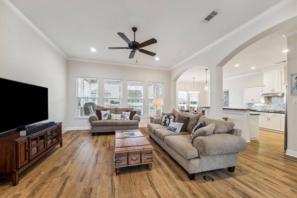 Open floor plan makes for easy flow. A wall of windows provides abundant natural light.