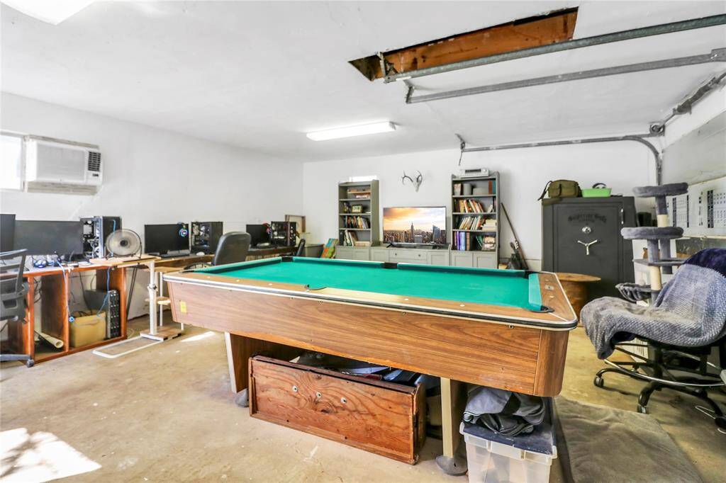 This versatile space has been transformed into a vibrant homeschool/game room, perfect for learning and leisure.
