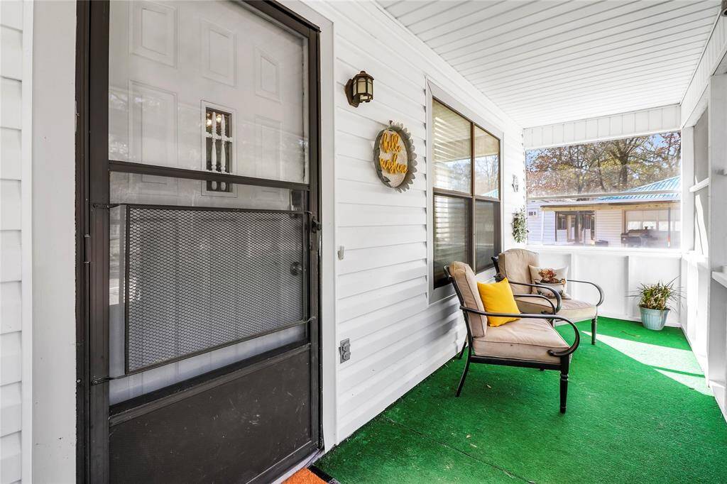Start your day with tranquility on this inviting porch.