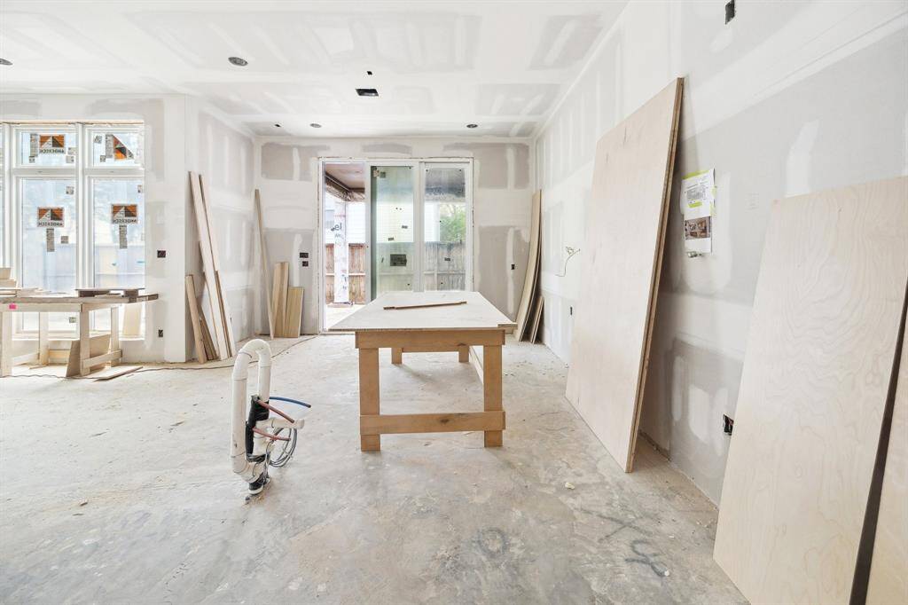 Another view of the Family Room which features a wall of windows.