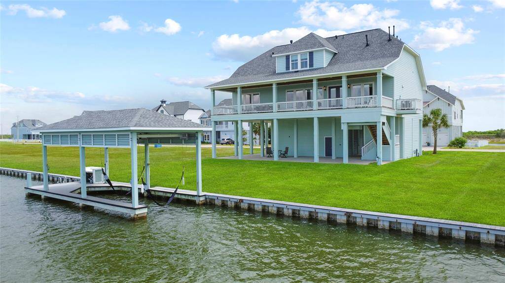 LOCATED ON WEST GALVESTON BAY, THIS HOME OFFERS THE IDEAL ESCAPE WITHOUT THE HASSLE OF ISLAND TRAFFIC.