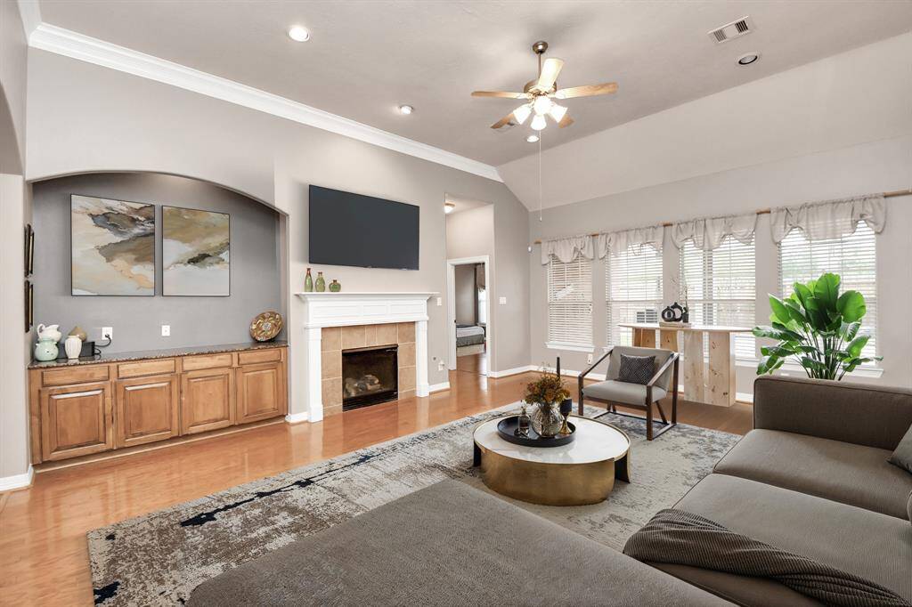 Elegantly UPDATED primary bathroom with a spacious walk-in shower, dual sinks, and a freestanding soaking tub. Convenient access to a spacious walk-in closet.