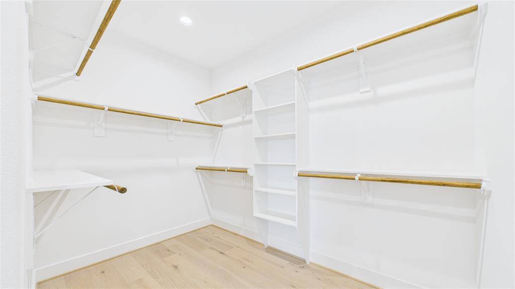 One of the two primary closets.
