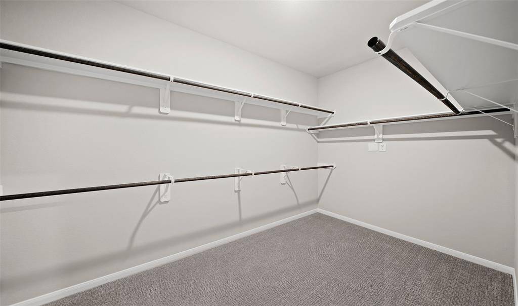 Large walk-in closet in owner's suite (*Photo not of actual home and used for illustration purposes only.)