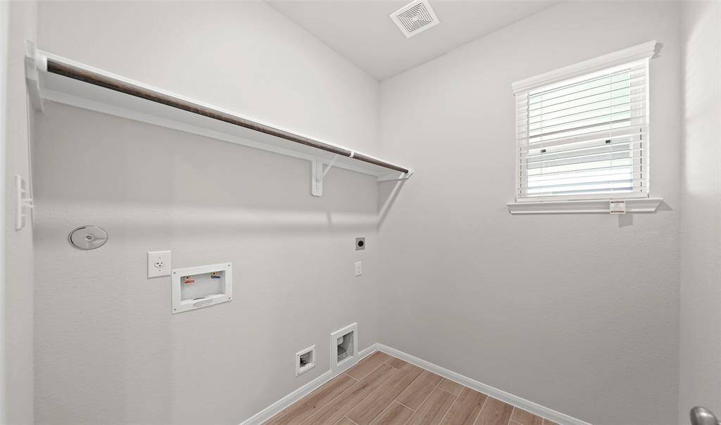 Laundry room (*Photo not of actual home and used for illustration purposes only.)