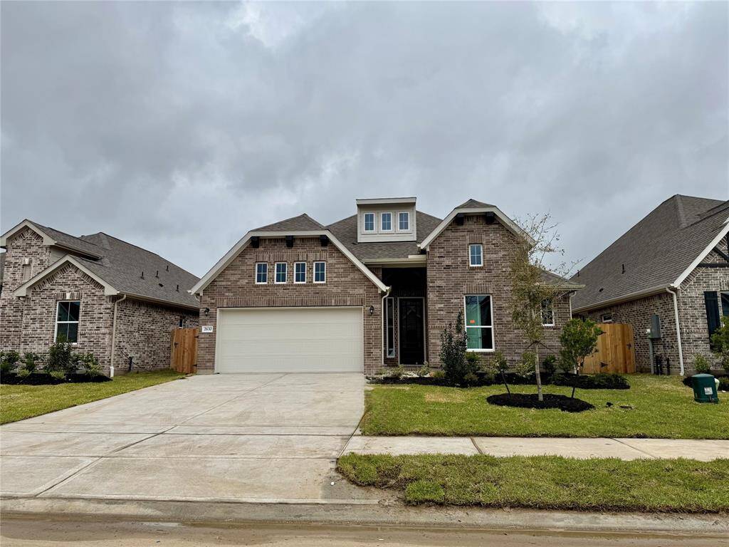 One story house with 3 bedrooms, 2 baths, and 2 car garage.