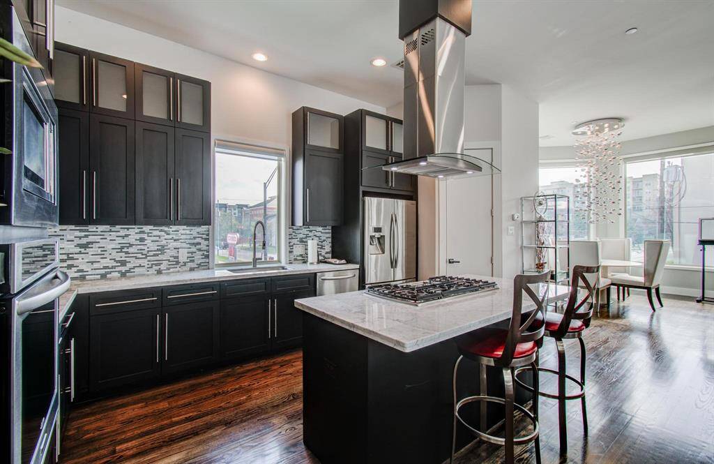 Granite countertops and with tons of cabinet space and storage in this fabulous kitchen!