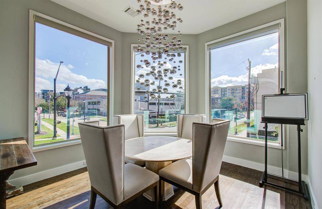 Separate breakfast area with immaculate views and modern lighting.