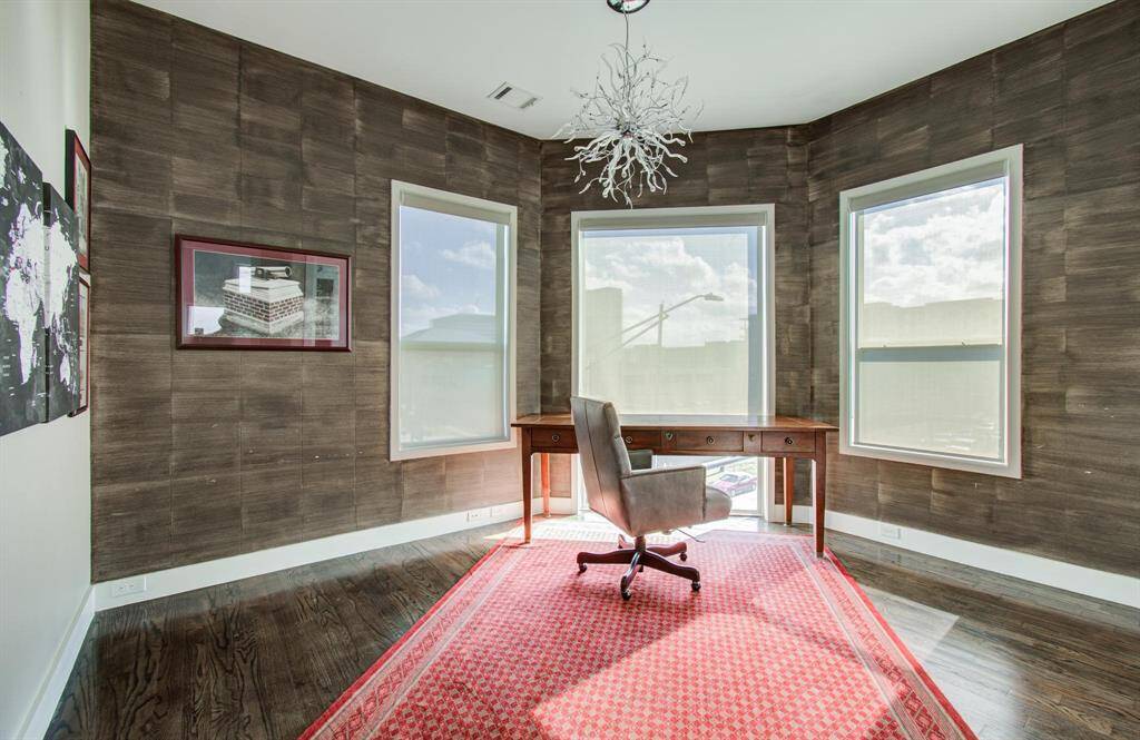 Large secondary bedroom currently used as on office, located on the 3rd floor.