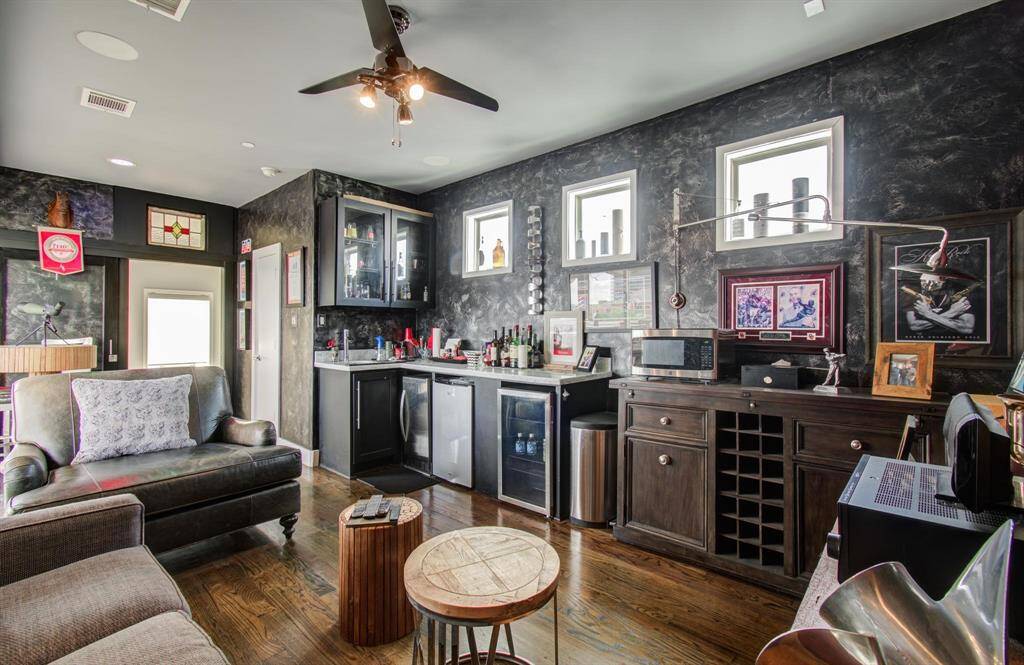 This 4th floor space has a bar sink, storage and plenty of space for a sectional or game table.
