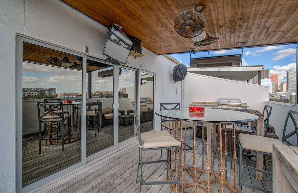 On the rooftop deck, enjoy grilling sports watching, and downtown views! There is also a large storage closet to store cushions or other items you don't want to leave outside.