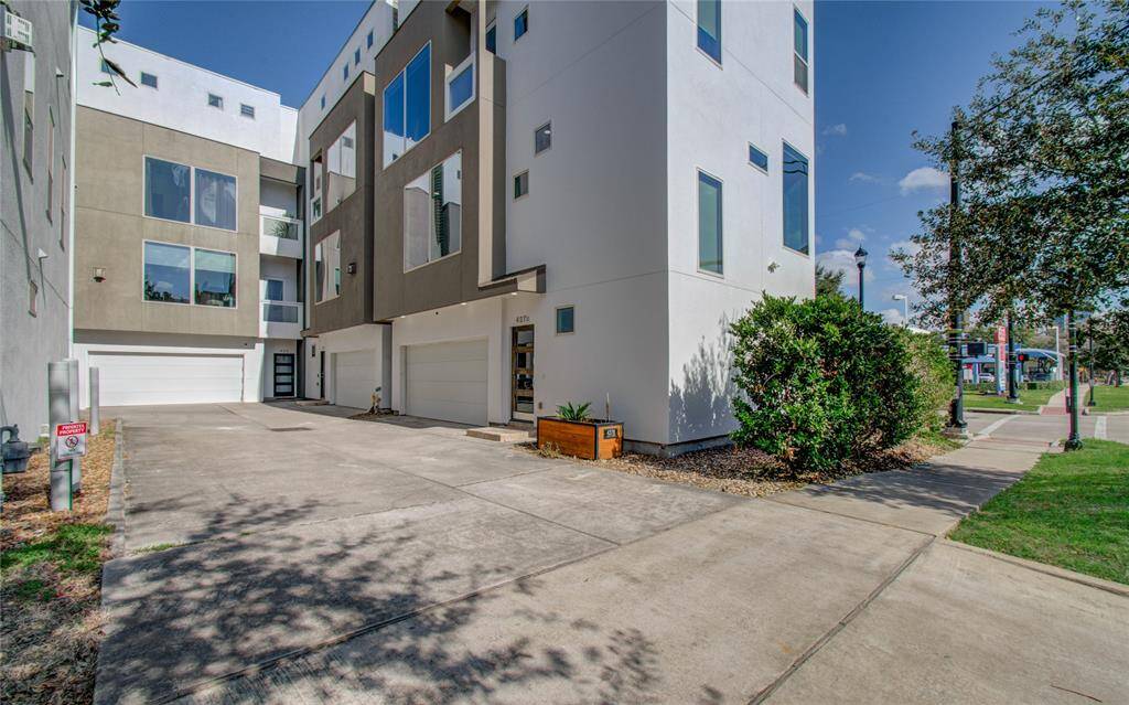 Gorgeous corner, single family home with roof top deck!