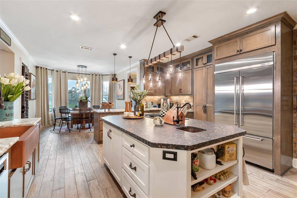 The open layout flows into the cozy breakfast area.