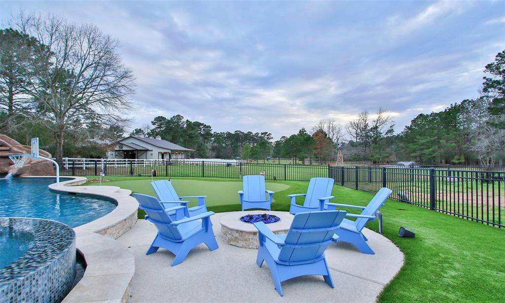 Enjoy plenty of adult conversations around this stone fireplace.