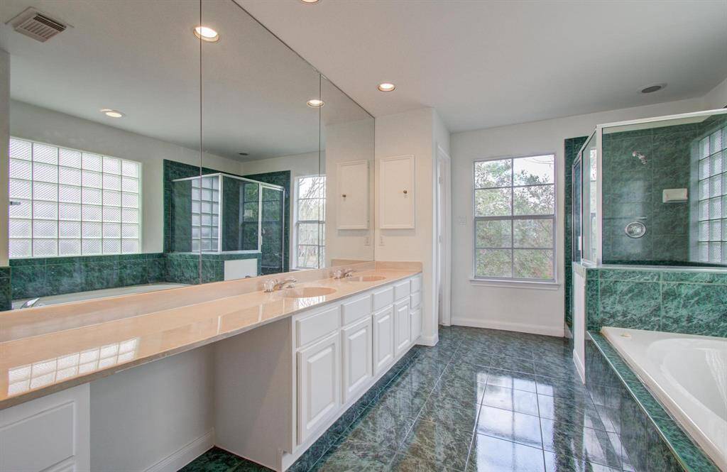 Primary bathroom with double-sink vanity