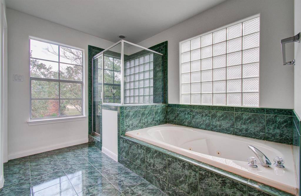Jacuzzi tub and stand-up shower