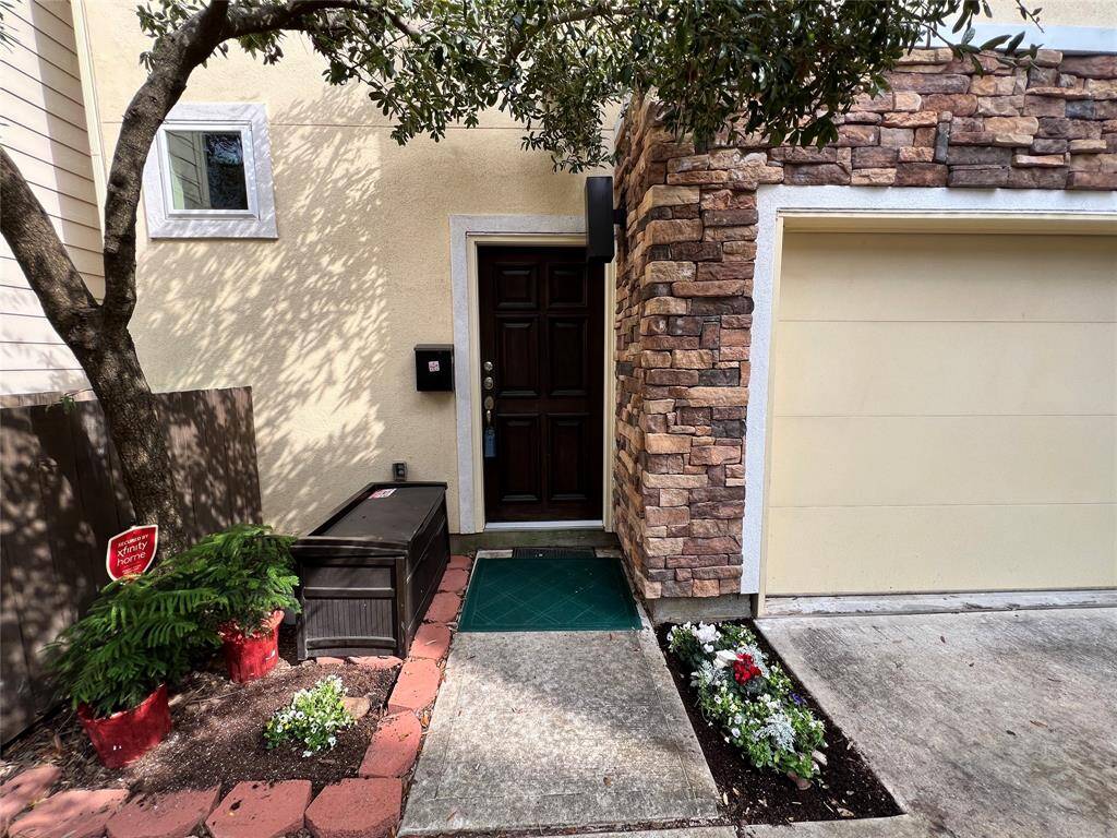 Enter thru front door or thru garage into downstairs foyer.