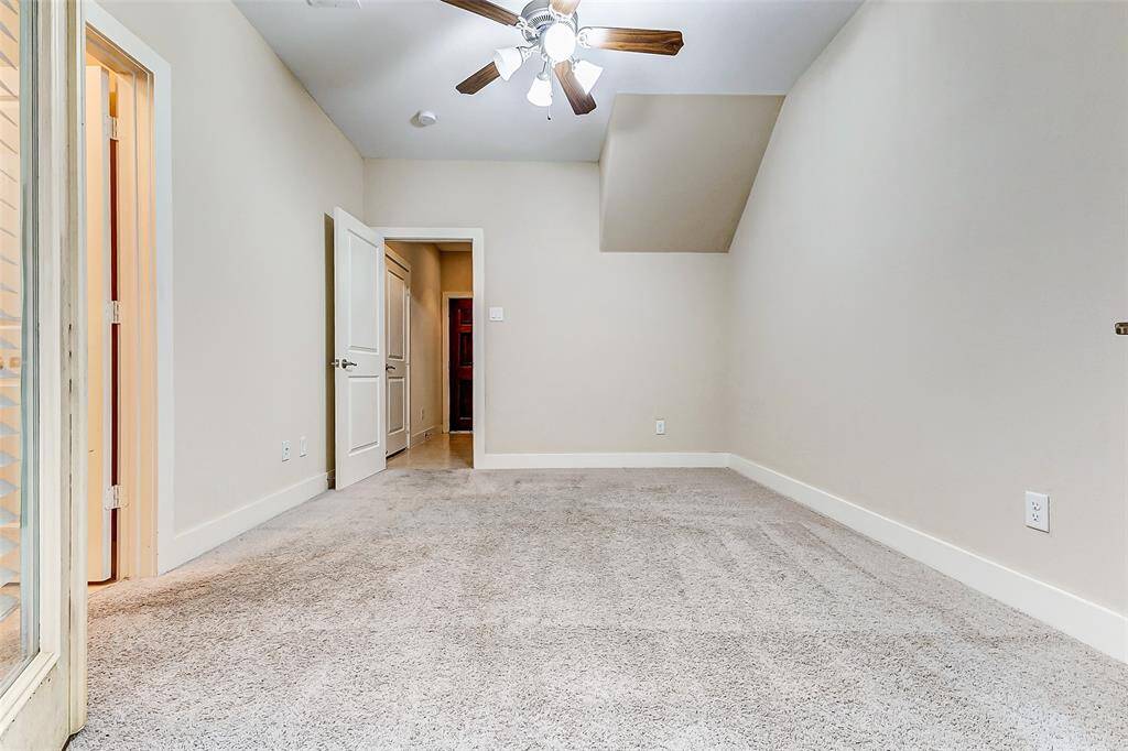 Versatile downstairs room opens into foyer; has it's own private full bath. Perfect for a home office, fitness room. or guest bedroom