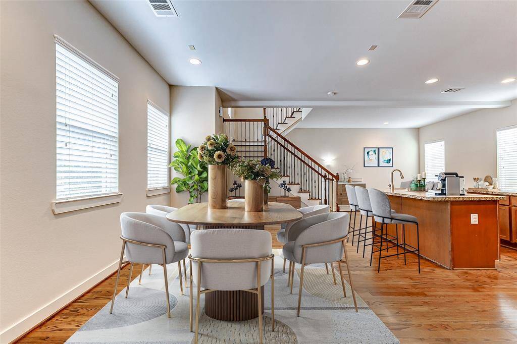 Open kitchen with island and breakfast bar. Great for entertaining.  Virtually staged.