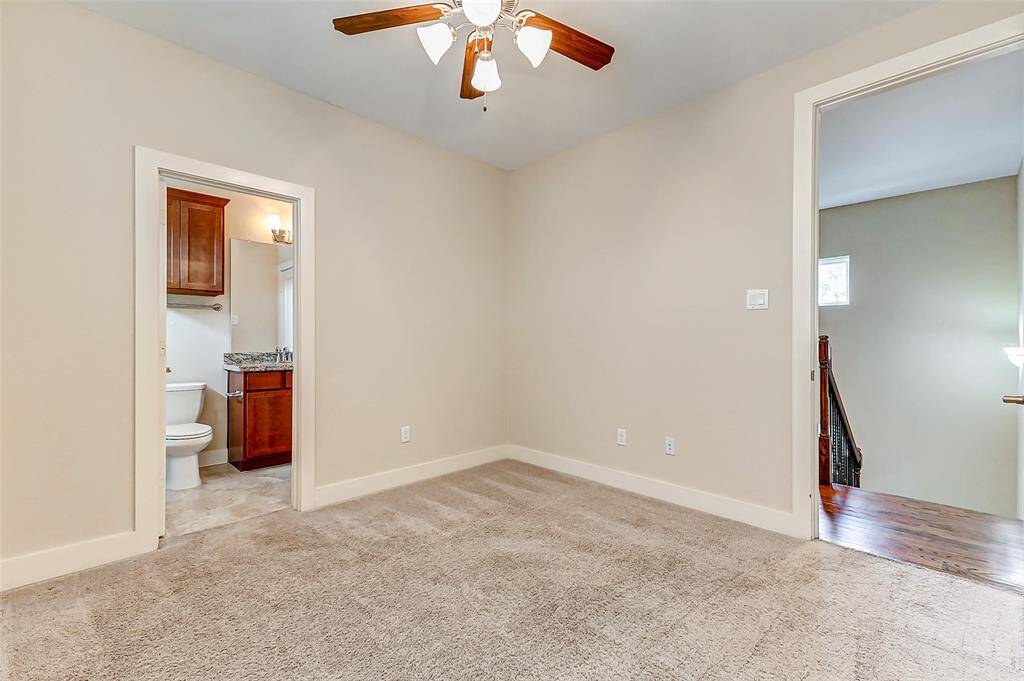 3rd bedroom at top of stairs with full bath