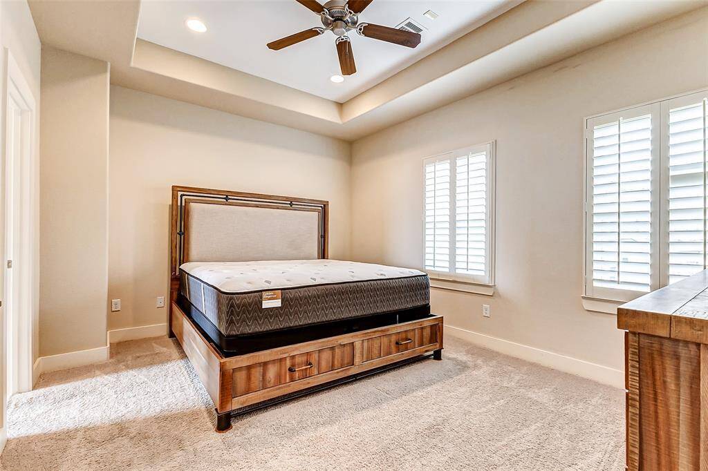 Primary bedroom; shuttered windows   Furnishings available for purchase or negotiation.