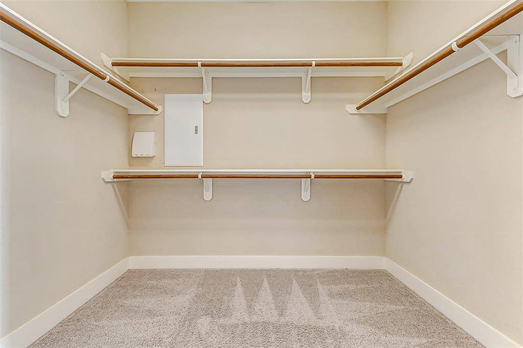 Large walk-in closet in primary bedroom