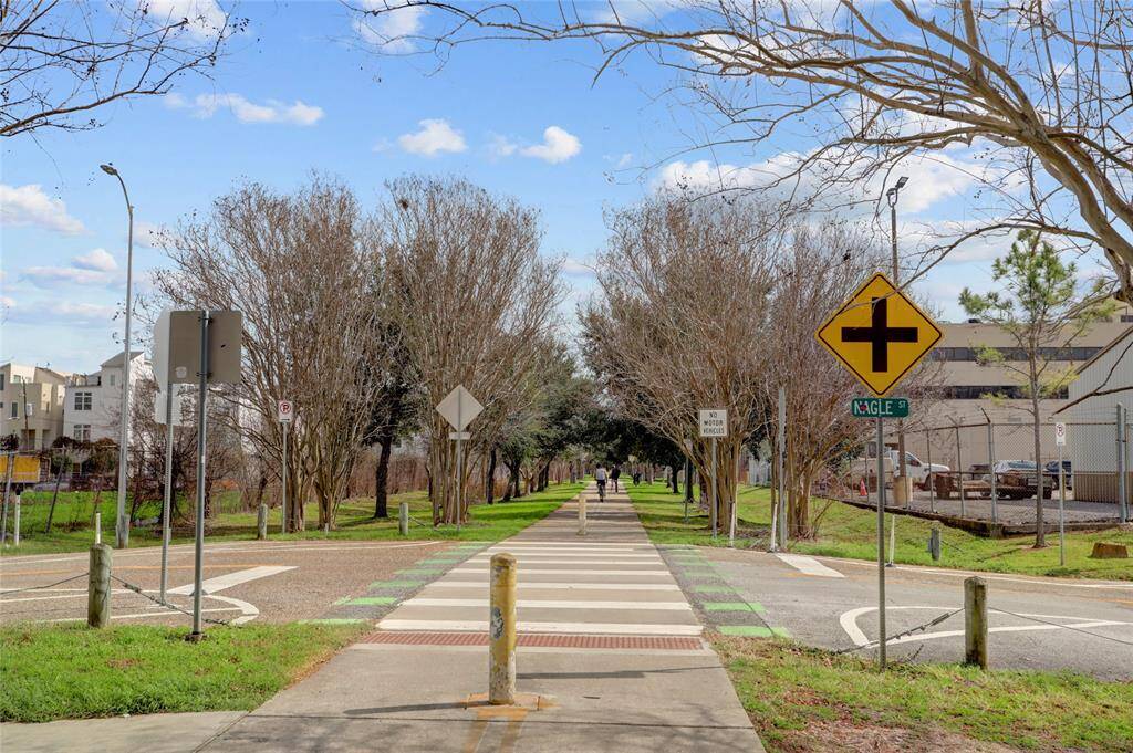 The pedestrian & bike trail, located directly in front of the home's front door.
