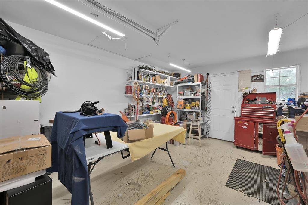 This workshop at the back of the secondary dwelling could be converted into living space.