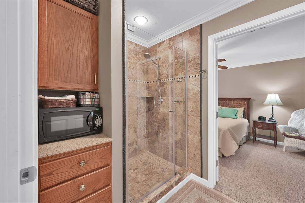 Bathroom seperating the bedroom and living space in the secondary dwelling