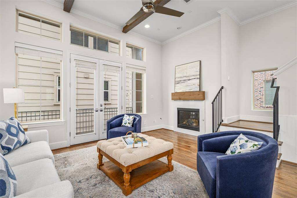 The gathering space is set up for daily lounging, watching TV [electrical outlet above the wood block mantle] and for entertaining friends, neighbors and family members.