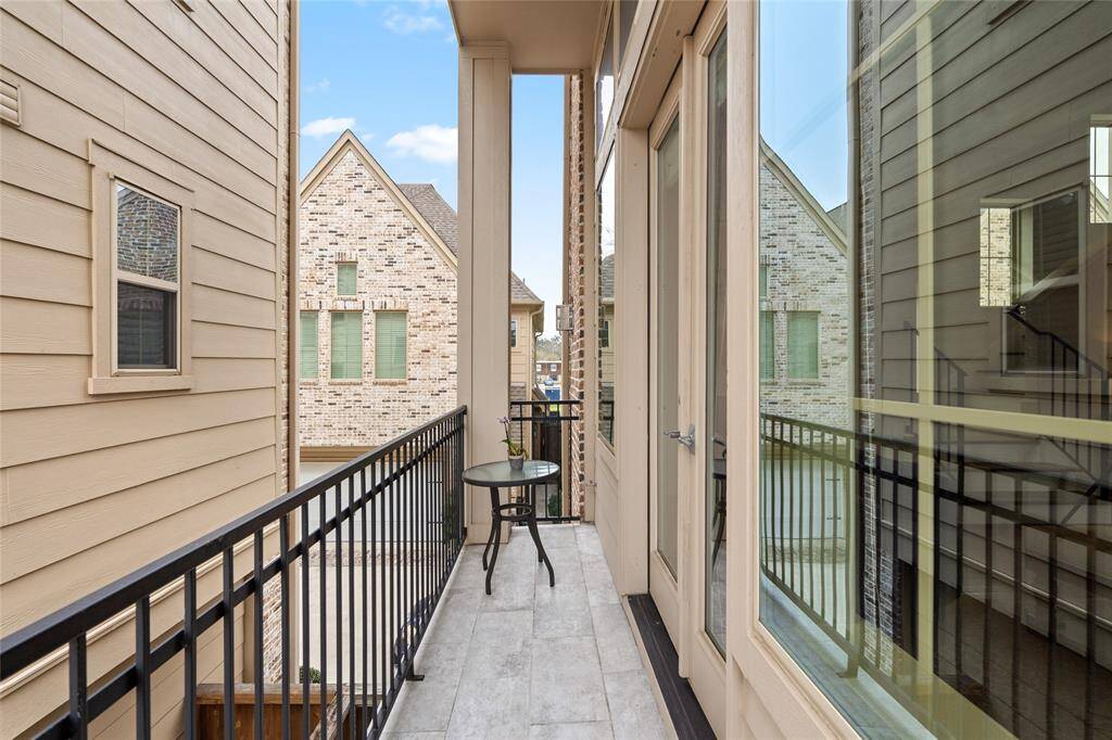 Second level balcony adjacent to the living room.
