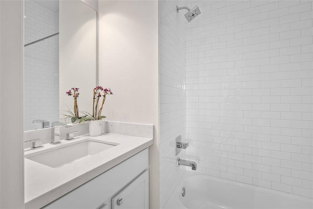 Take a look inside the second full bathroom for the bedroom on the third floor.